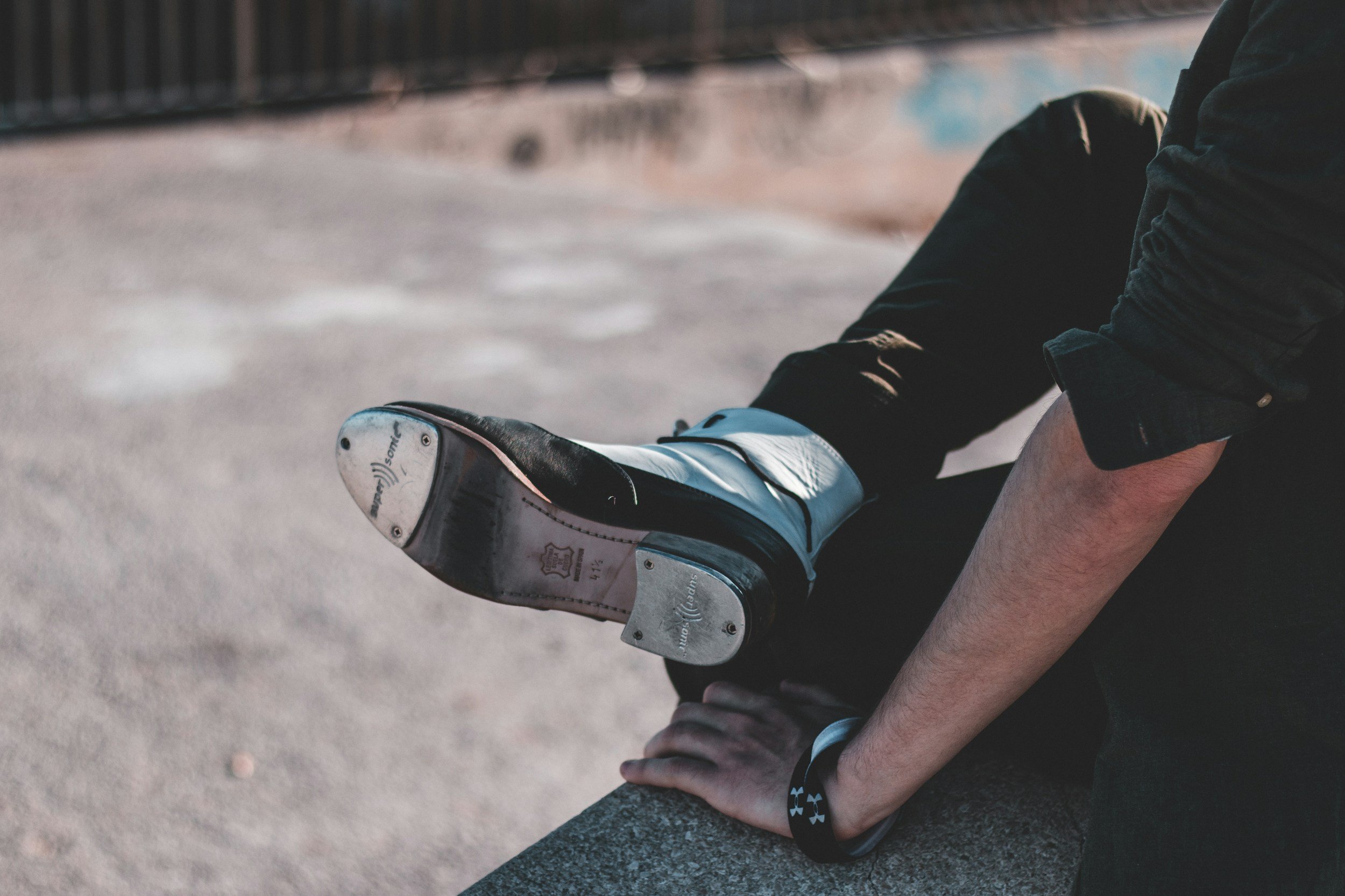 Dancer wearing tap shoes with metal taps